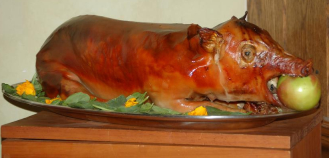 Suckling pig in plum sauce, stuffed with chestnuts and white truffles. A man must eat