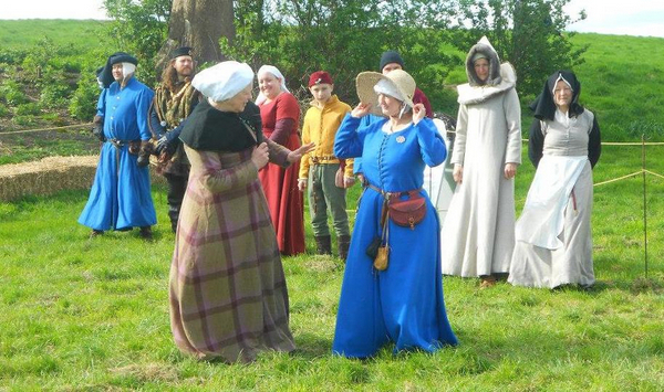 Medieval fashion show showing what was worn as you progressed through the social hierarchy in 1461