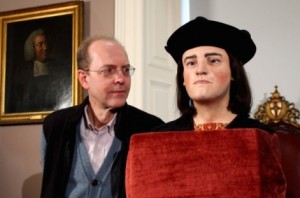 Michael Ibsen, a descendant of of King Richard III, poses for photographers as the face of the king is unveiled to the media at the Society of Antiquaries, London.