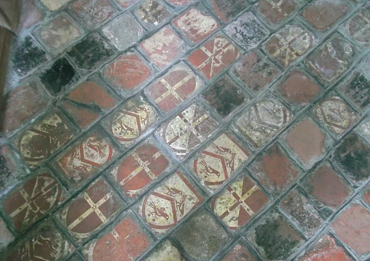 Floor tiles showing the arms of Rhys ap Thomas in St Mary’s church, Carew. © Patricia Taylor